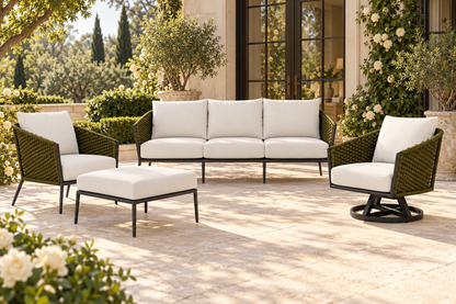 Lloyd Flanders Escape Ottoman in an AI-styled garden setting; olive weave, charcoal frames and Canvas Natural cushions