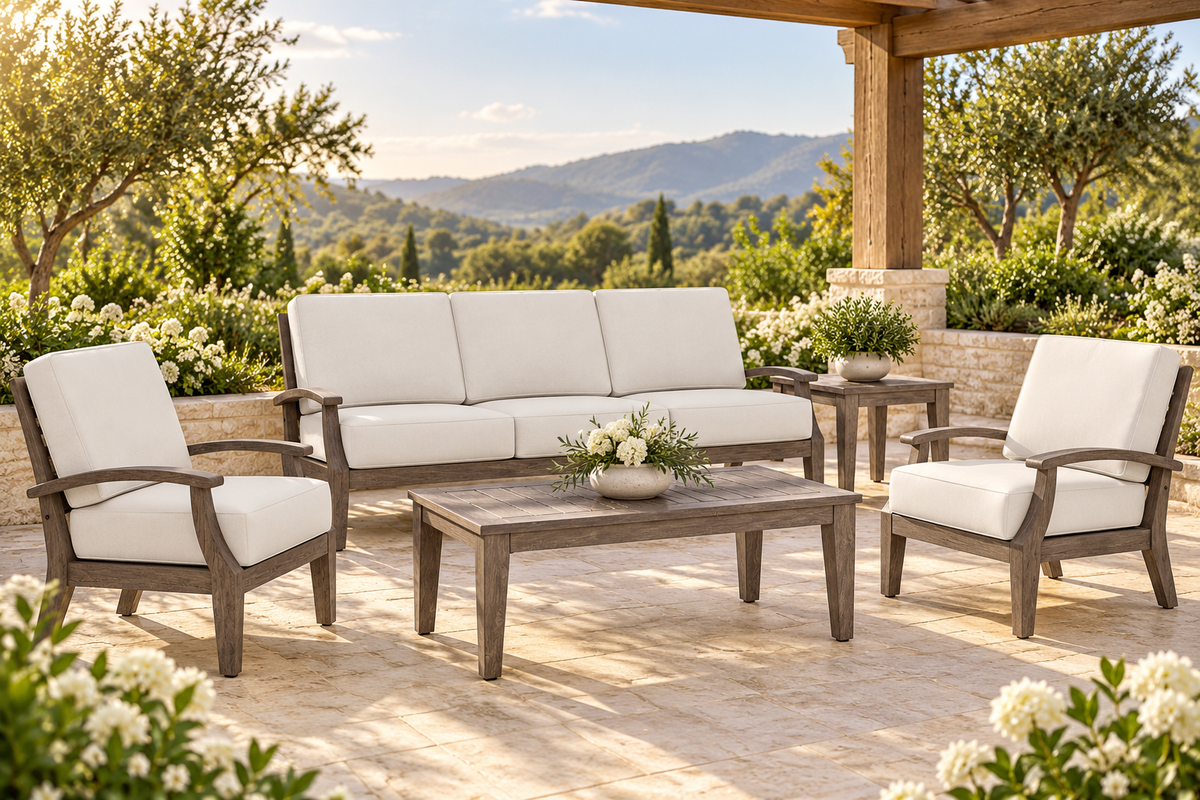 Lloyd Flanders Frontier Lounge Chair in an AI-styled garden setting; weathered wood-look frame and Canvas Natural cushions