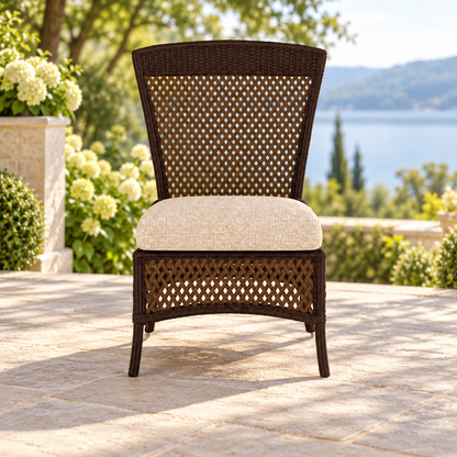 Lloyd Flanders Grand Traverse Armless Dining Chair on a lakeside garden terrace