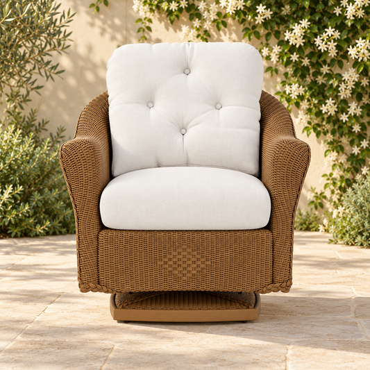 Lloyd Flanders Reflections Swivel Glider Lounge Chair in an elegant flowering garden patio setting