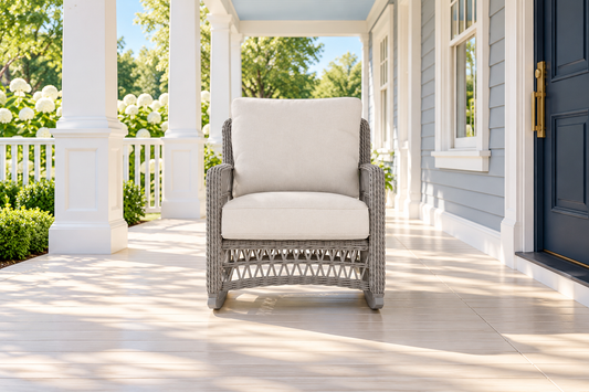 Lloyd Flanders Mackinac Lounge Rocker, sold individually, in an AI-styled luxurious front-porch setting.