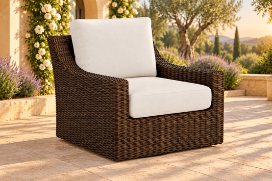 Lloyd Flanders Mesa Swivel Glider Lounge Chair in an AI-styled garden setting. Sold individually; other items are not included.