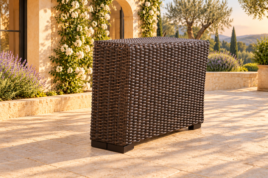 Lloyd Flanders Mesa Wedge Table in an AI-styled garden setting. Sold individually; other items are not included.