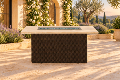 Lloyd Flanders Mesa 52" Rectangular Fire Table in an AI-styled garden setting. Sold individually; other items are not included.