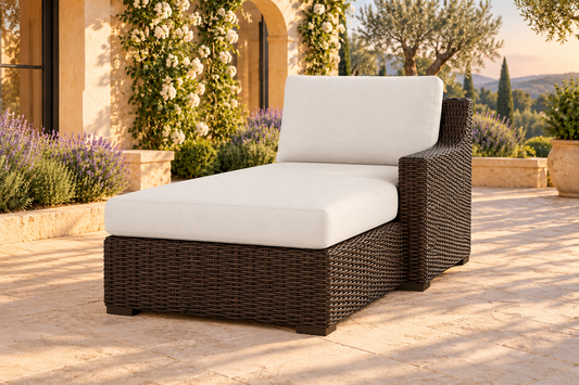 Lloyd Flanders Mesa Left Arm Chaise, sold individually as a Mesa sectional component, in an AI-styled garden setting with Pecan weave and Canvas Natural cushions.