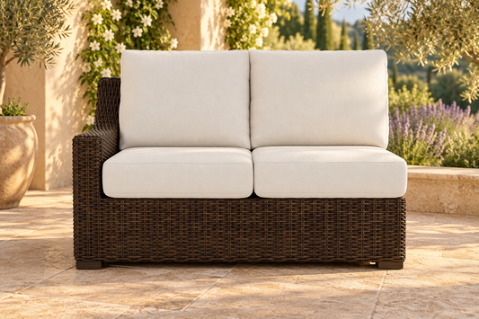Lloyd Flanders Mesa Right Arm Loveseat, sold individually, in an AI-styled garden setting with Pecan weave and Canvas Natural cushions.