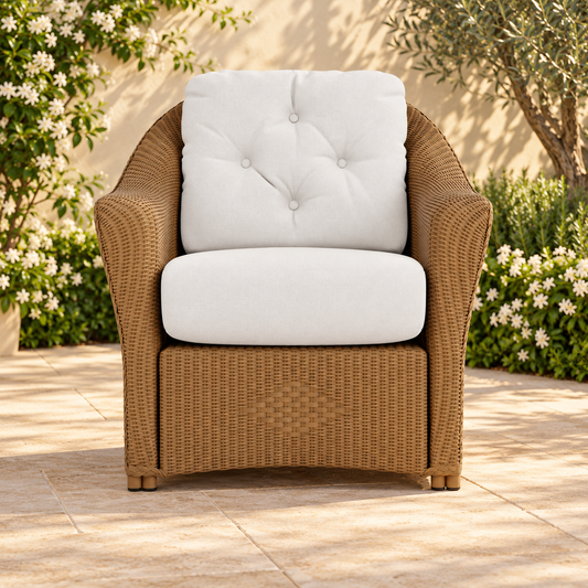 Lloyd Flanders Reflections Lounge Chair in an elegant flowering garden patio setting